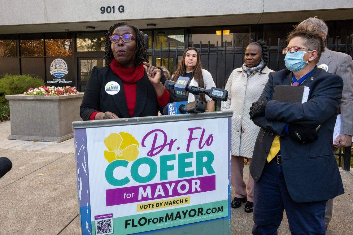 Sacramento mayoral candidate Flojaune Cofer speaks at a press conference in December outside the office of Sacramento District Attorney Thien Ho accusing the DA of “criminalizing homelessness” with his lawsuit against the city of Sacramento.