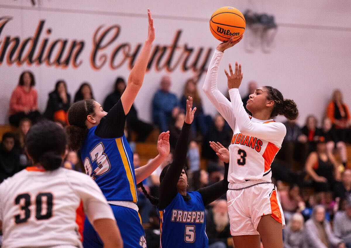 Marysville Indians guard Demi Boykin (3) takes a shot as the Prospect Panthers’ Akeisha McDaid (23) defends in a first-round CIF State Northern California Division IV playoff game in Marysville on Tuesday.