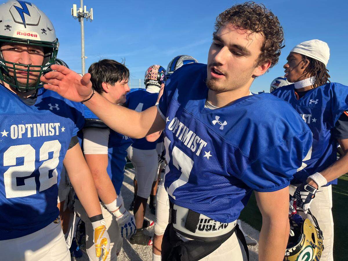 North Optimist All-Star quarterback Ricky Cole of Inderkum, right, rushed for two touchdowns to key a 35-7 victory in the 65h Optimist All-Star Football Classic on Saturday at Granite Bay High School.