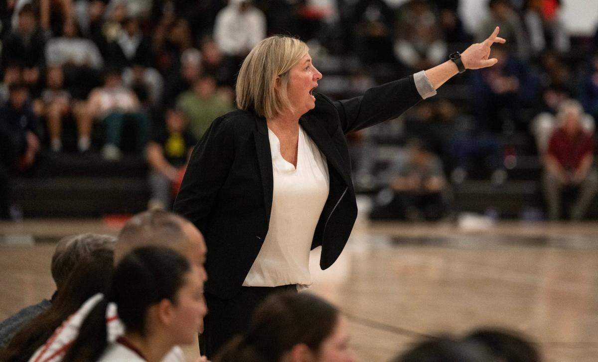 Sierra College Wolverines coach Brandie Murrish directs her players against Santa Rosa Junior College during the inaugural game at the Rocklin campus’ new gymnasium Tuesday.