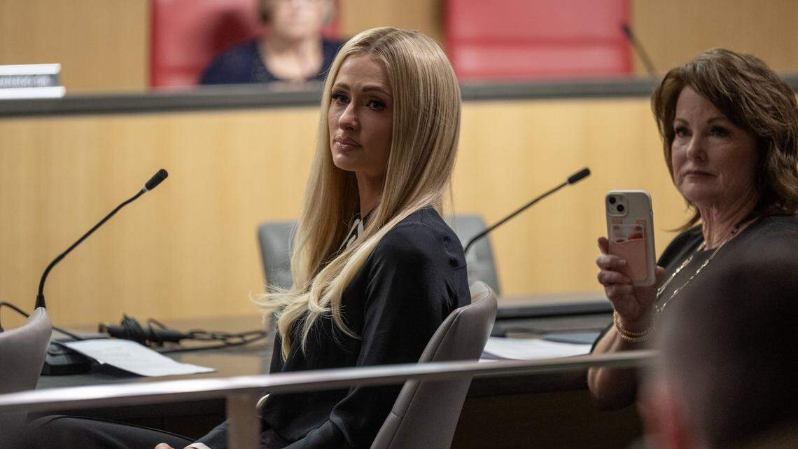 Senator Shannon Grove (R-Bakersfield), right, in partnership with celebrity advocate and survivor Paris Hilton listen to supporters after their testimony to a Senate committee in 2024. Hilton supports Grove’s new bill, SB 373, which aims to protect California youth in out-of-state facilities.