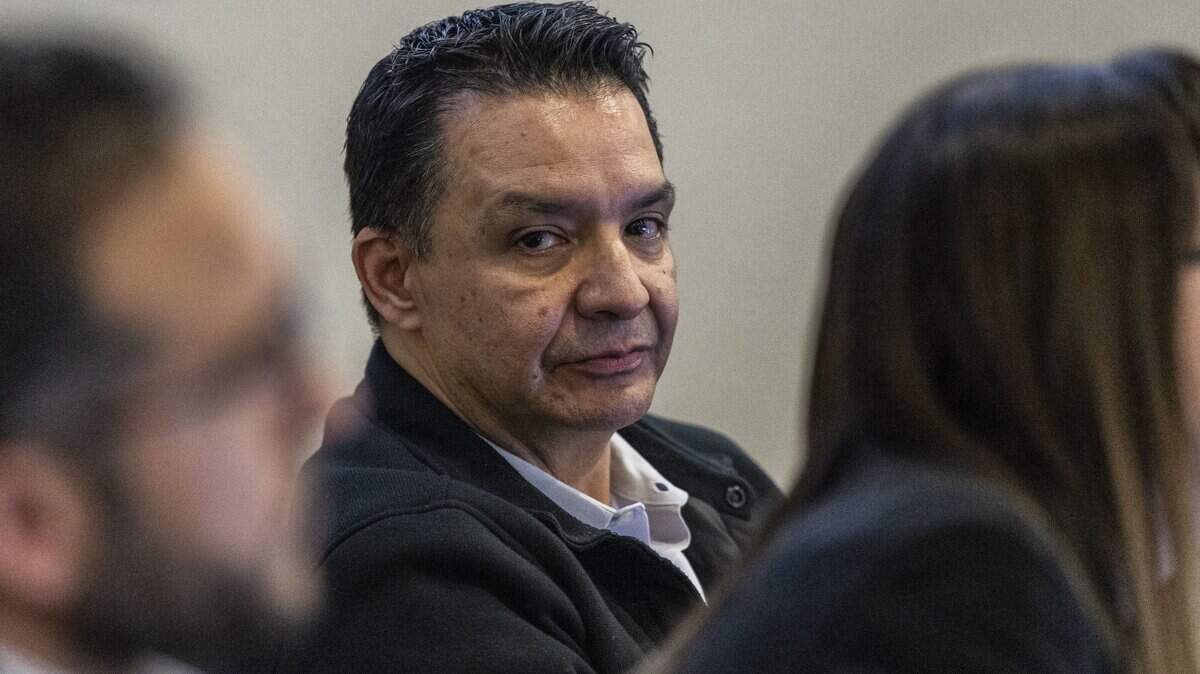 Twin Rivers Unified School District Superintendent Steve Martinez listens to public comments during a board meeting in February. Martinez will step down in October. 