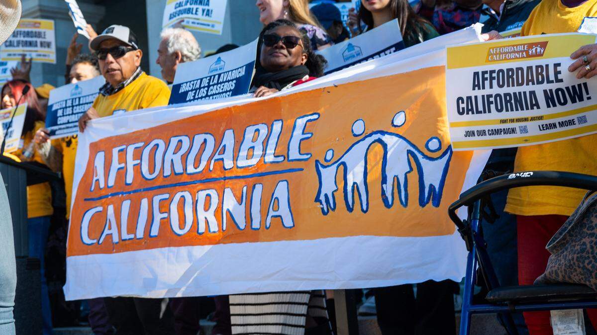 Supporters of a bill to cap rental rate increases to a maximum of 5% rally at the state Capitol in January.