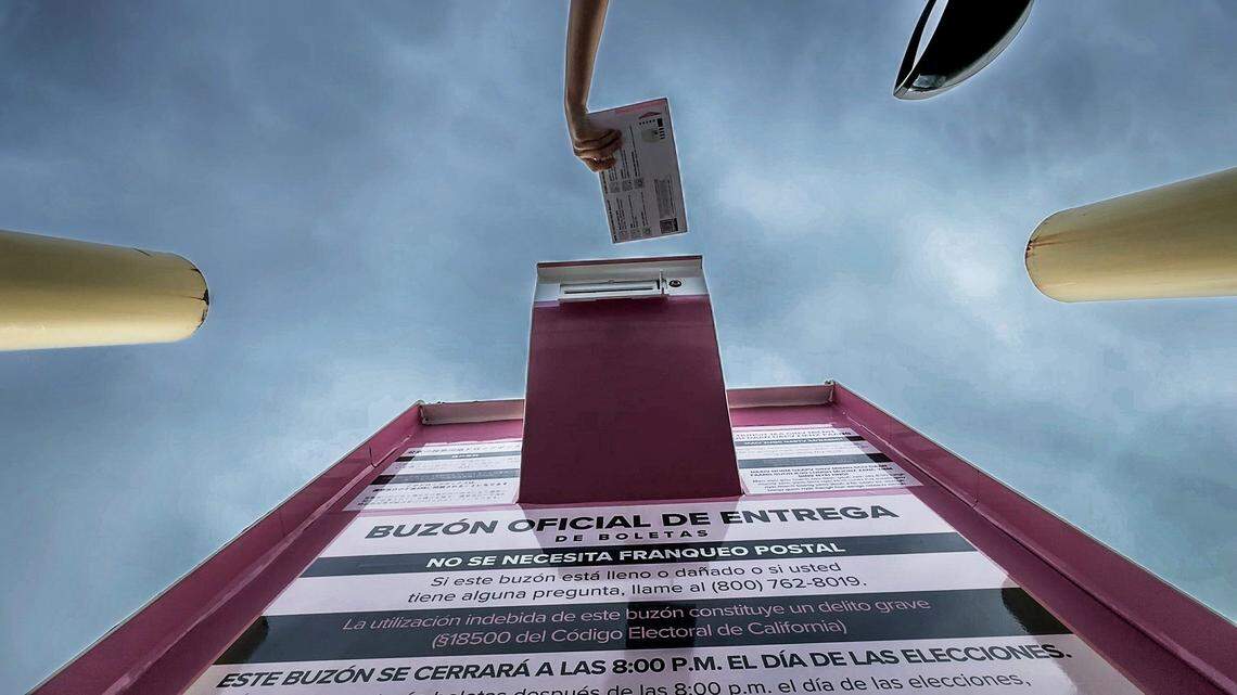 A motorist drops off a ballot at the Sacramento County Voter Registration and Elections office on Tuesday, Nov. 5, 2024.