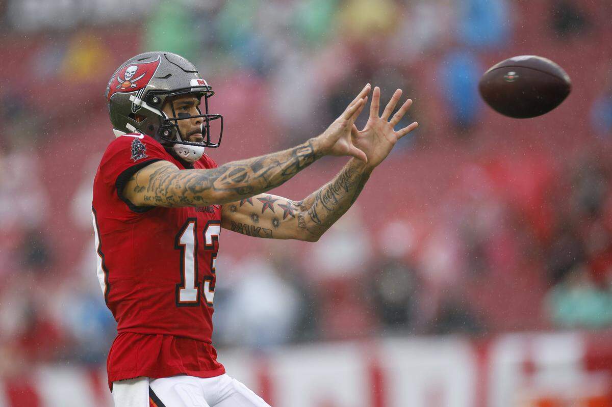 TAMPA, FLORIDA - JANUARY 03: Mike Evans #13 of the Tampa Bay Buccaneers warms up prior to the game against the Carolina Panthers during a game at Raymond James Stadium on January 03, 2026 in Tampa, Florida. (Photo by Mike Ehrmann/Getty Images)