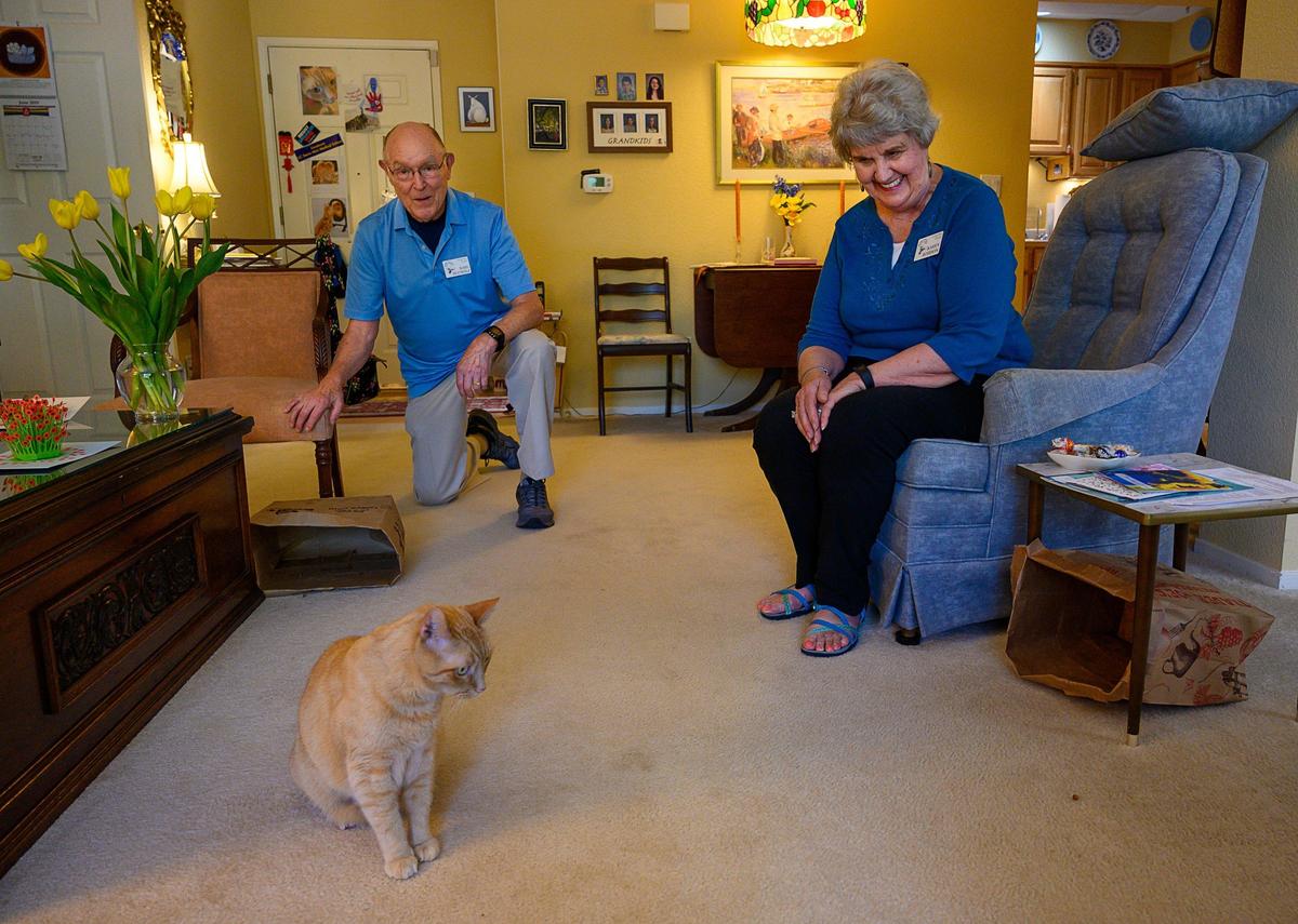 Karen Robison and Karl Bucholz talk to their cat at the Eskaton Village Carmichael on Thursday, June 13, 2019 in Carmichael. They moved from Wisconsin to Eskaton 10 years ago and plan to live their until the end of their lives.