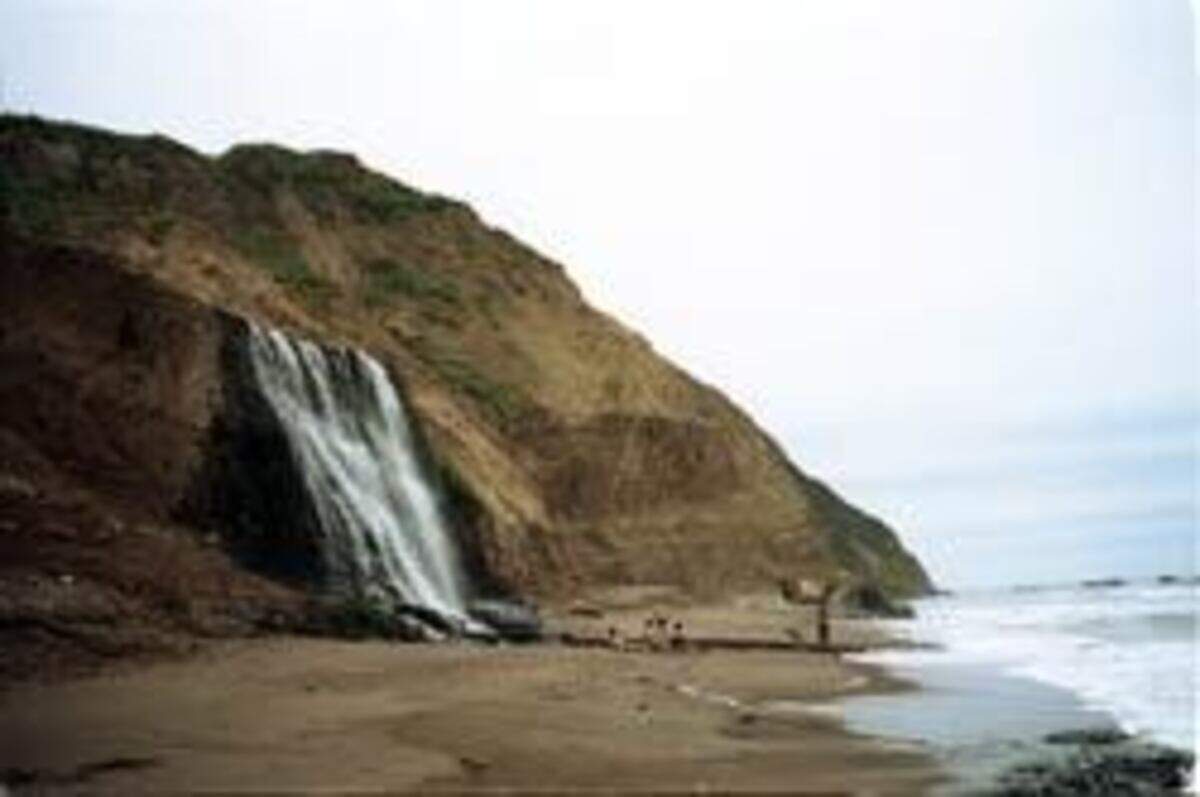 Hikers take in the spectacular sight of the Alamere Falls at Point Reyes National Seashore.