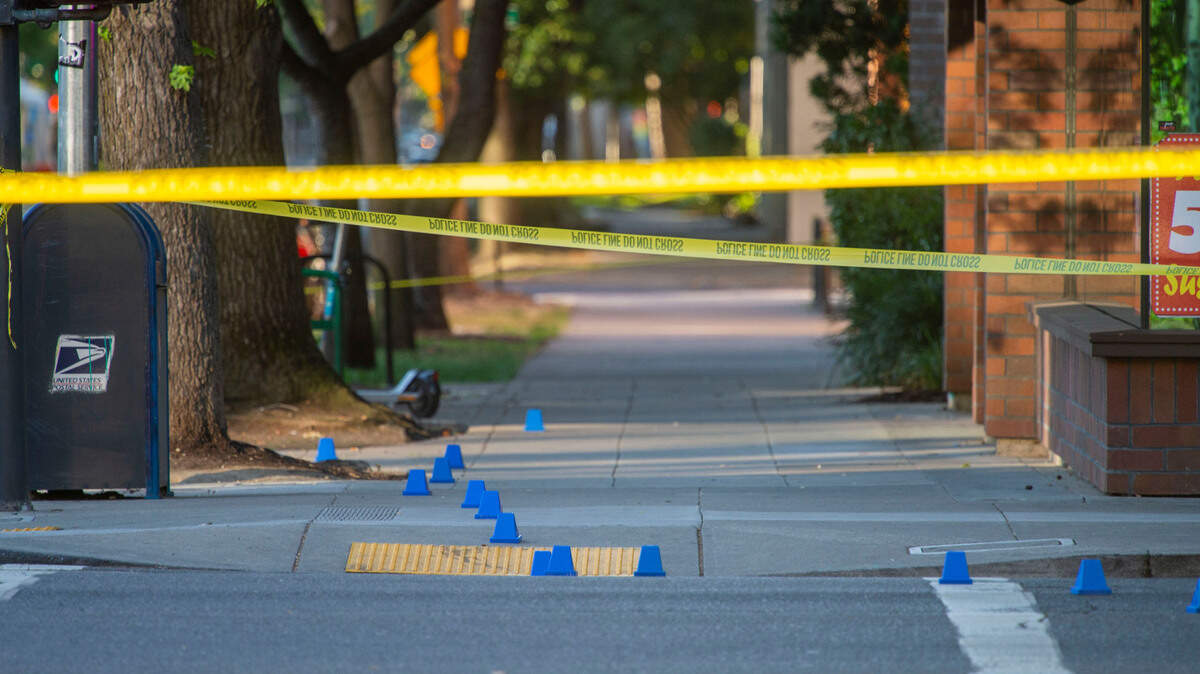 Evidence markers are seen on 16th and K streets in downtown Sacramento following a shooting with “multiple” victims on Monday, July, 4, 2022.