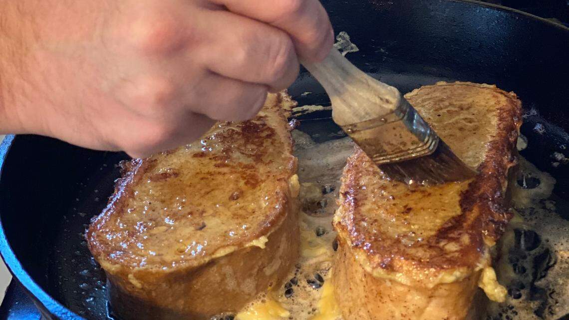 Glazing French toast with hot maple syrup is a simple way to add flavor to the breakfast treat.