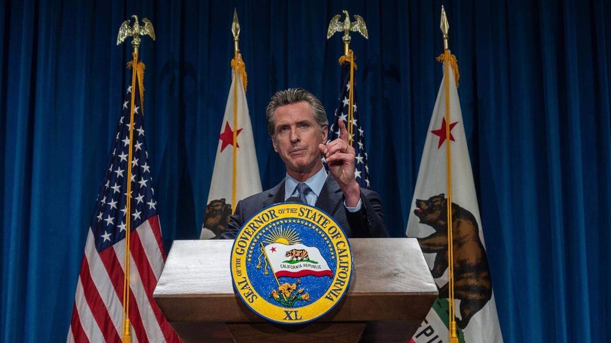 California Gov. Gavin Newsom answers questions from reporters after delivering his revised May budget proposal at a press conference on Friday, May 14, 2021 in Sacramento.