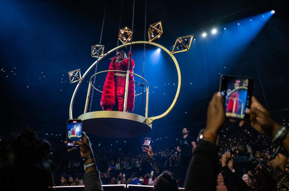 Mary J. Blige sings as she is lifted from the rear stage on a tiara-inspired platform during her concert at Golden 1 Center on Saturday.