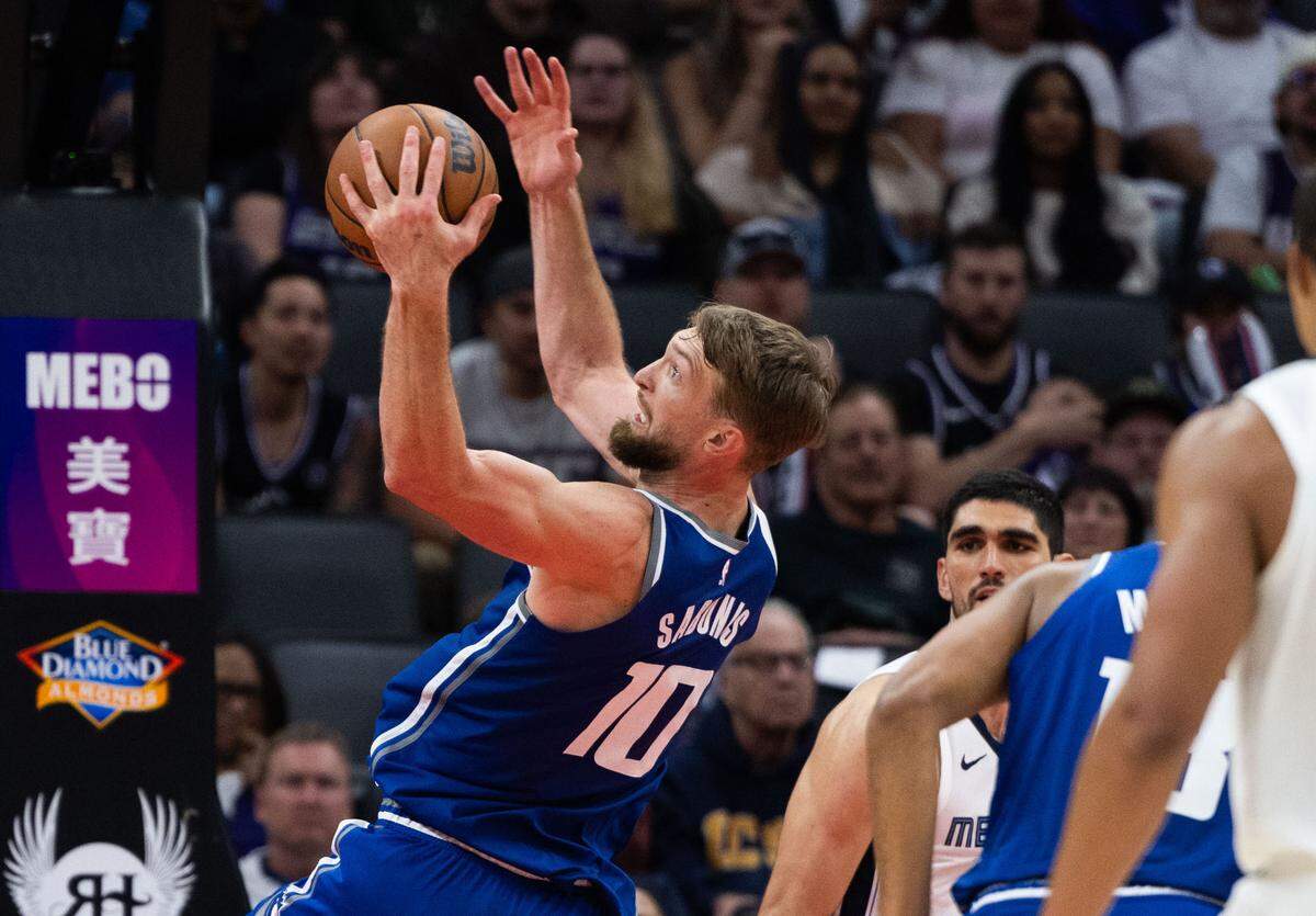 Sacramento Kings center Domantas Sabonis (10) gets a rebound against the Memphis Grizzlies at Golden 1 Center in March.