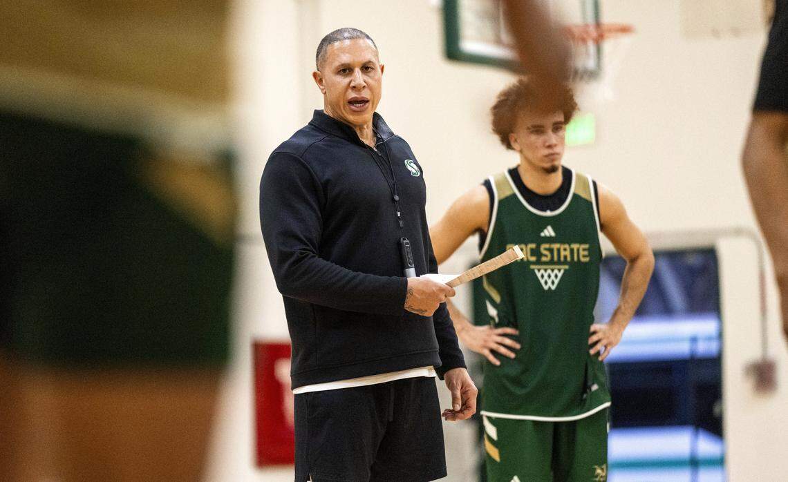 Sacramento State Head Coach Mike Bibby talks to players during practice on Oct. 24.
