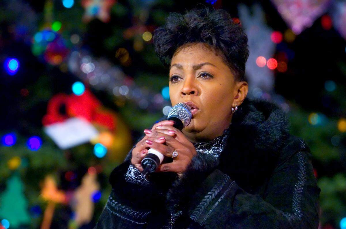 Grammy-winning vocalist Anita Baker sings in front of the 75th annual state Capitol Christmas tree during a ceremony on the west steps in 2006.