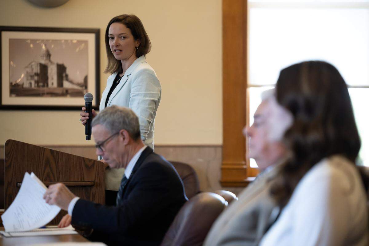 Adrienne Spohr, daughter of victims Gary Spohr and Wendy Wood, gives a victim impact statement as she looks at Samantha Scott on Monday. Scott was sentenced in Placer Superior Court to two years probation for aiding former Major League Baseball pitcher Daniel Serafini, who was convicted of shooting his wife's parents in their Lake Tahoe-area home.