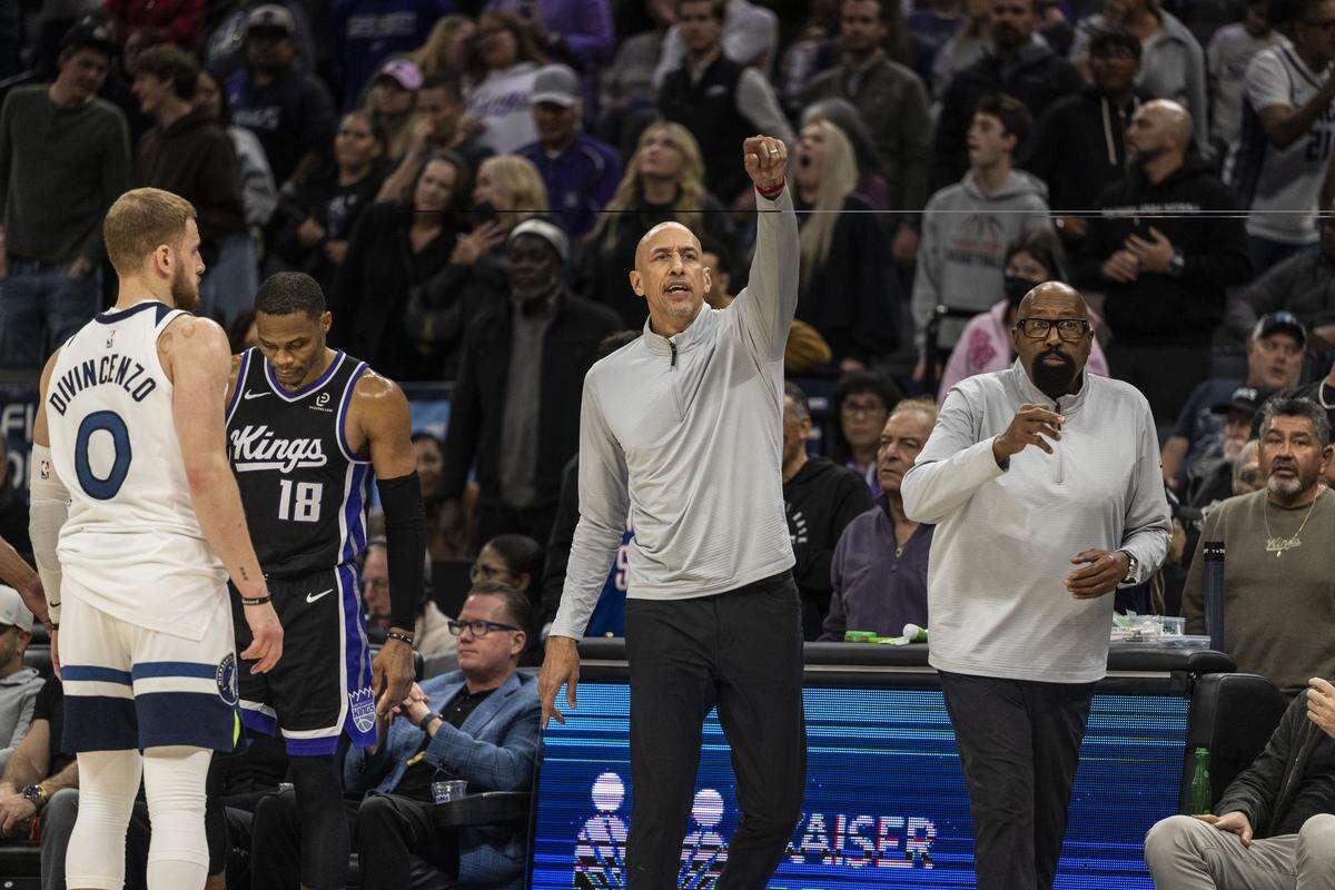 Sacramento Kings coach Doug Christie yells instructions as his team takes the lead in overtime against the Minnesota Timberwolves during an NBA game at Golden 1 Center on Monday.