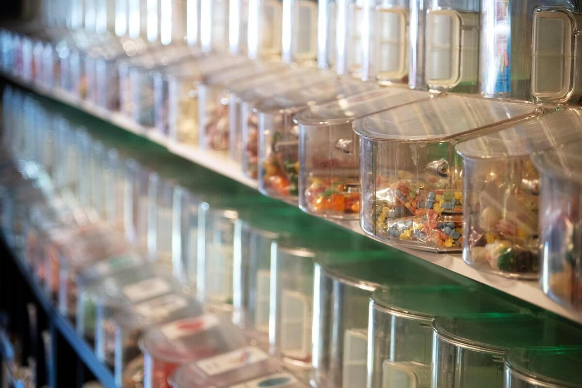 Plastic bins of candy line the walls at Sawyer’s Sweet Spot in Woodland in August. The store has 110 bulk candies for sale.