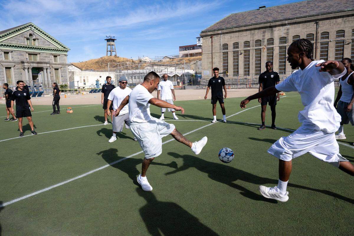 Sacramento Republic FC members practice warmup drills with inmates at Folsom State Prison before a scrimmage Tuesday.