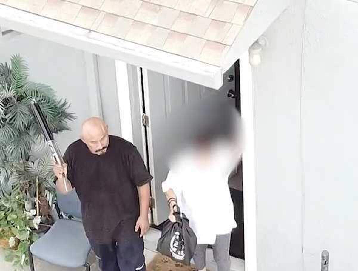 Vincent Martinez, 55, is seen holding a shotgun in a drone video provided by the Sacramento County Sheriff’s Office. Martinez was shot and killed by deputies during a hostage situation at a south Sacramento home in 2022. On Tuesday, the Sheriff’s Office requested more drones for the coming year to aid with high-risk scenarios.