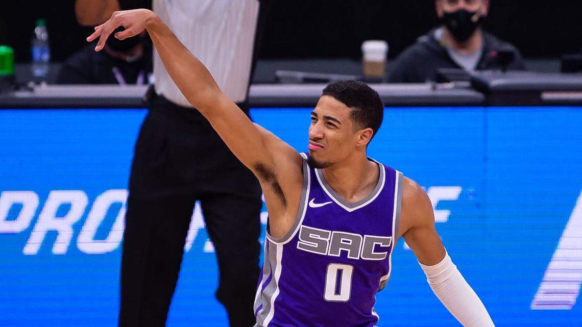Sacramento Kings guard Tyrese Haliburton (0) watches a three pointer drop with confidence as they play the Denver Nuggets during the fourth period of the NBA game Tuesday, Dec. 29, 2020, at Golden 1 Center in Sacramento. The Kings beat the Nuggets 125-115.