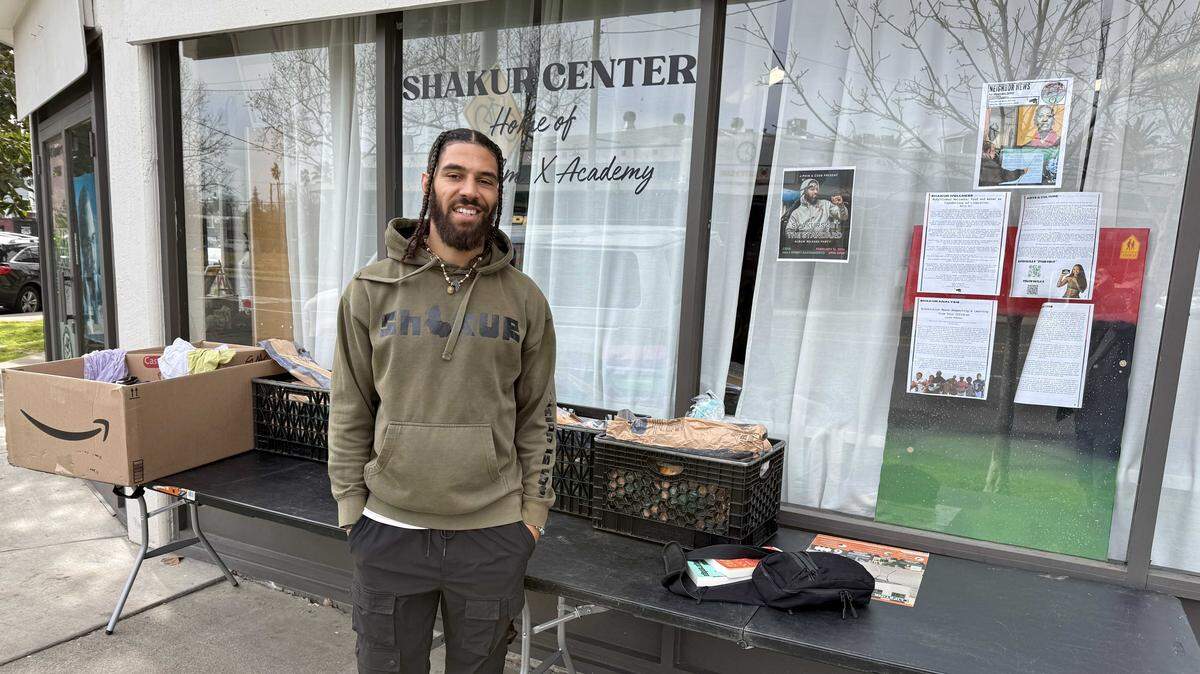 Jordan McGowan of Neighbor Program organizes giveaways of grocery boxes three times a week. Recipients need no qualifications, no questions asked.