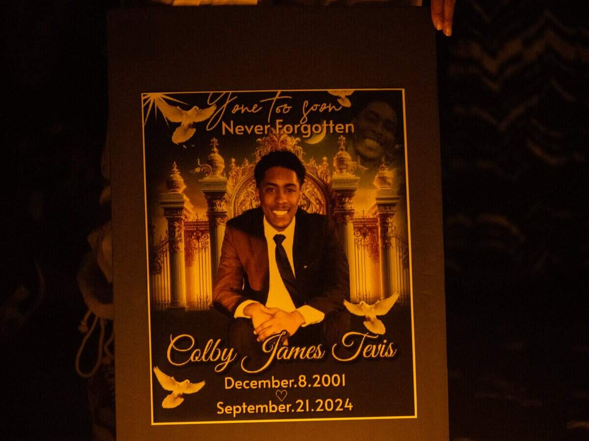A poster of Colby Tevis is displayed at a vigil at Burberry Community Park in Sacramento on Monday, Sept. 23, 2024. He was killed and another hospitalized after a shooting early Saturday morning on J Street in midtown Sacramento.