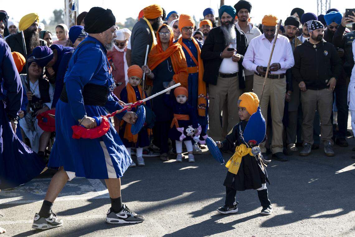 A performance of gatkha, a martial art involving swords, before the Nagar Kirtan, also known as the Sikh Parade, in Sutter County on Sunday, Nov. 2, 2025.