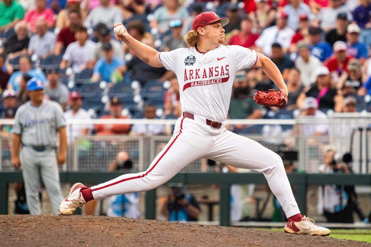 Jun 17, 2025; Omaha, Neb, USA; Arkansas Razorbacks pitcher Aiden Jimenez (16) pitches against the UCLA Bruins during the sixth inning at Charles Schwab Field. Mandatory Credit: Dylan Widger-Imagn Images