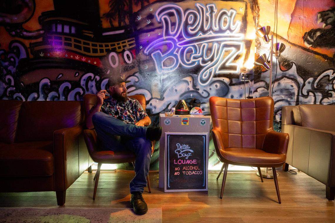 Customer Vince Purdue smokes cannabis in the Delta Boyz dispensary and consumption lounge in Isleton in 2024. Delta Boys has the only cannabis consumption lounge in Sacramento County.