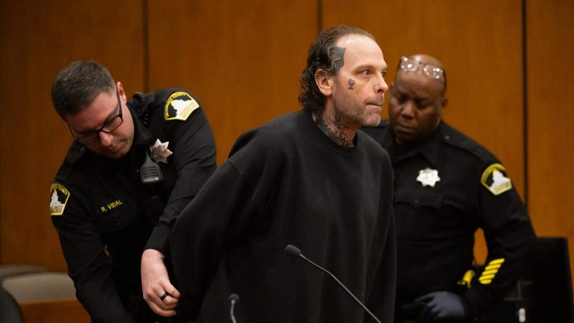 Joseph Paul DeMarco is removed from Sacramento Superior Court after being sentenced to life without parole on Friday for the 2024 drive-by shooting of James Roseman. The murder of Roseman, a Black man, was determined to be a hate crime.