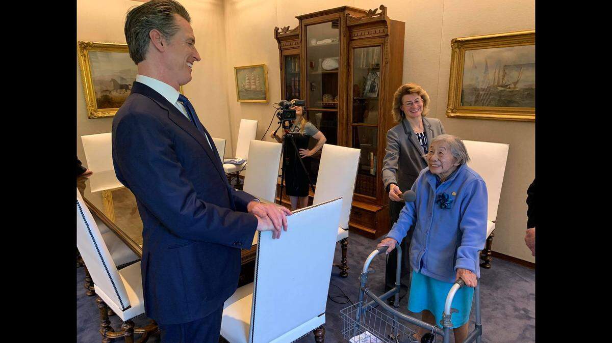 May Lee — who spent nearly 80 years working in civil service — meets with Gov. Gavin Newsom in 2019. She died on May 26, according to the Department of General Services. She would’ve turned 103 on June 28.