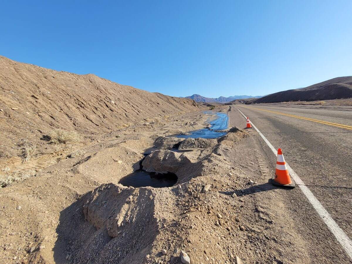 The trucking company is working with the National Park Service to clean up the wreck site. They dug holes to contain the liquid asphalt.
