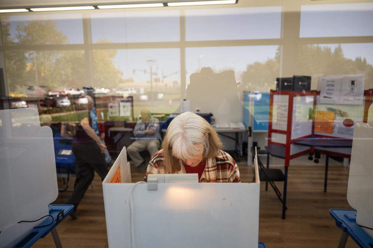 Susan Silva fills out her ballot at the vote center at the Placer County Clerk-Recorder-Elections Office in Rocklin on Tuesday, Oct. 28, 2025.