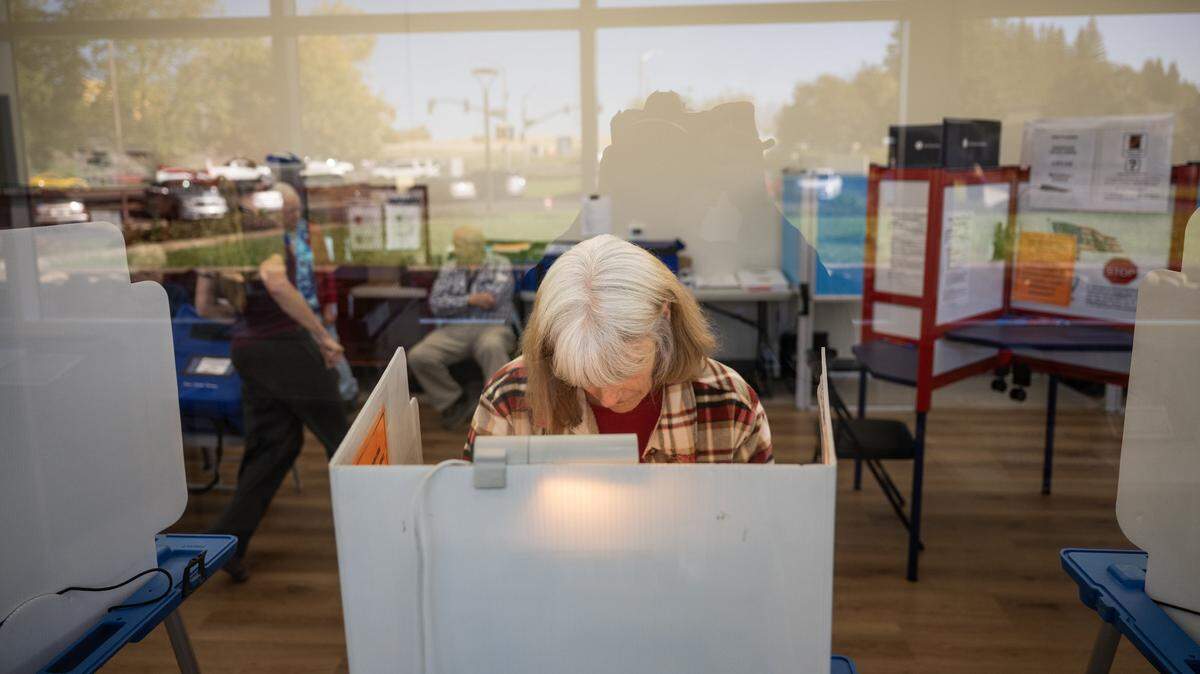 Susan Silva fills out her ballot at the vote center at the Placer County Clerk-Recorder-Elections Office in Rocklin on Tuesday, Oct. 28, 2025.