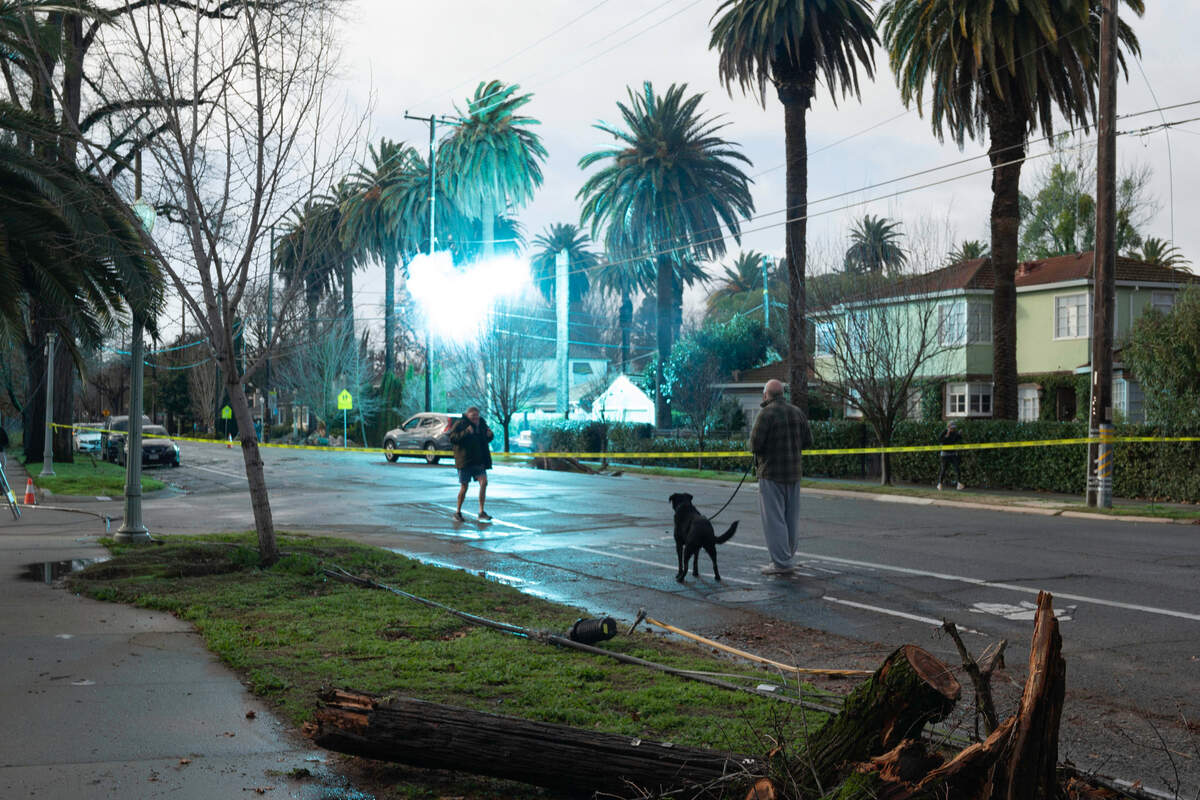 An electrical transformer explodes on Riverside Boulevard in Sacramento on Sunday as high winds and falling trees disrupted the power grid across the Sacramento region.