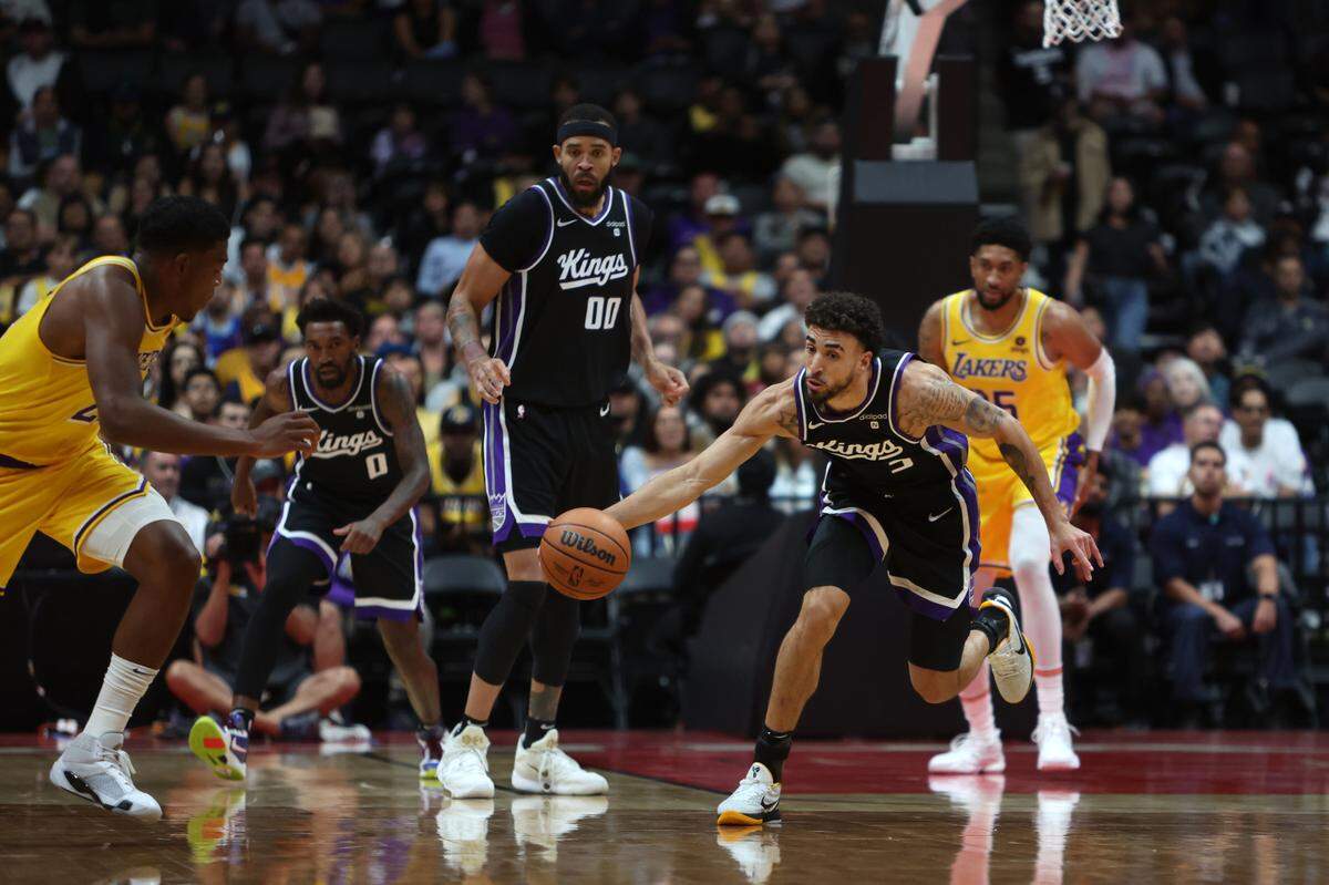Sacramento Kings guard Chris Duarte (3) dribbles the ball during the first half against the Los Angeles Lakers on Wednesday, Oct. 11, 2023, at Honda Center in Anaheim.