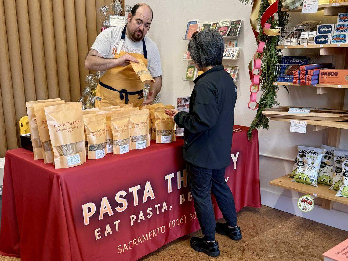 Chef Jason Azevedo of Pasta Therapy sells his pastas and sauces at a pop-up at Land Park's Superette Market on Nov. 23, 2025. Three of the Sacramento pasta company’s products were named finalists for the 2026 Good Food Awards. 