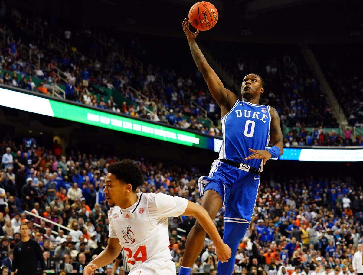 Duke Blue Devils forward Dariq Whitehead (0) drives to the basket against the Miami (Fl) Hurricanes during the second half of the semifinals of the ACC tournament on March 10, 2023, at Greensboro Coliseum in Greensboro, North Carolina.