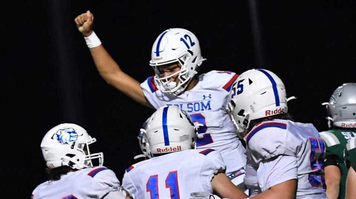 Folsom quarterback Austin Mack (12), seen during a September game, passed for a career-best 410 yards with five touchdowns in the Bulldogs’ 34-7 victory against Del Oro, Friday, Oct. 14, 2022.