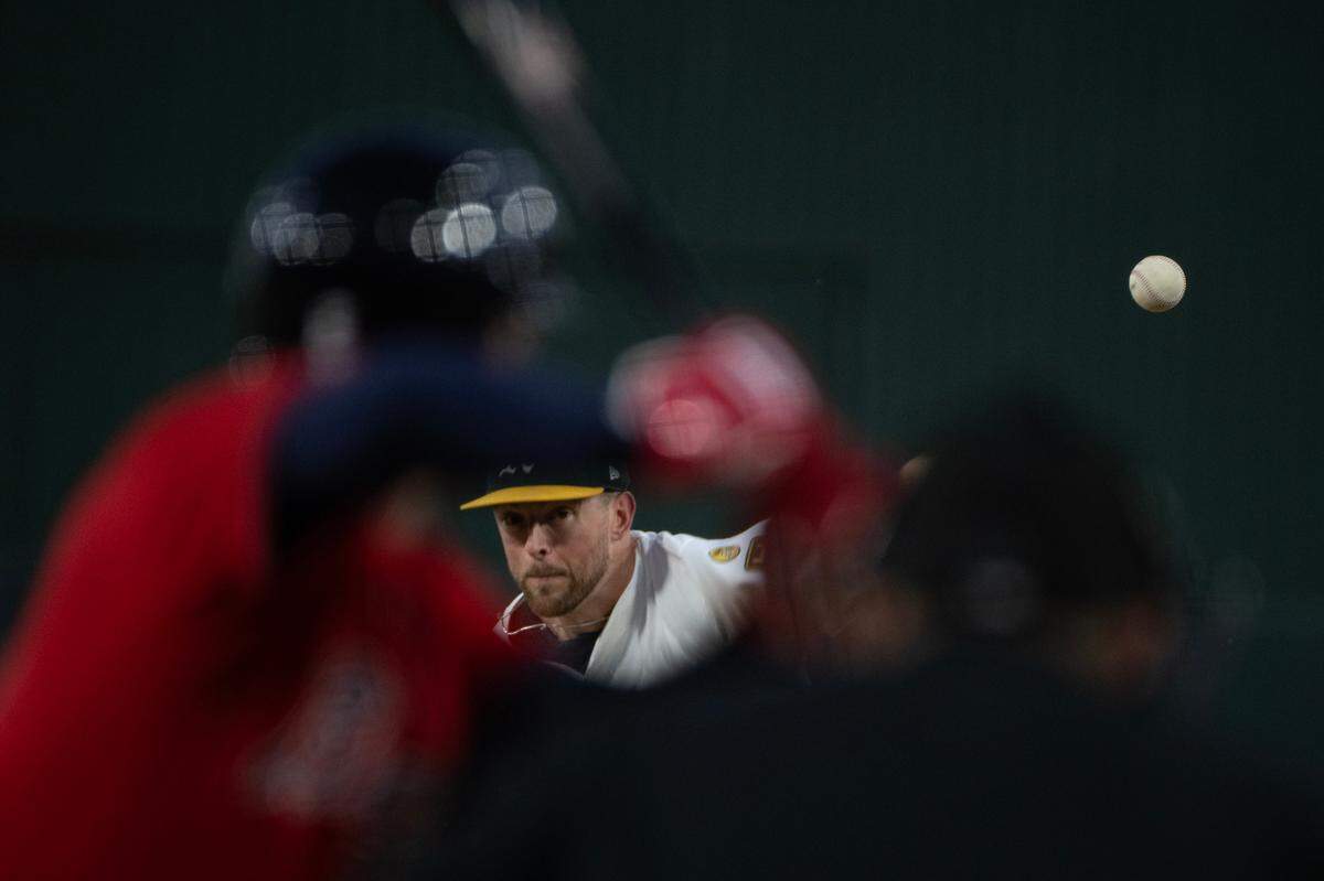 Athletics pitcher Jeffrey Springs (59) pitches against the Atlanta Braves in the fifth inning on Tuesday at Sutter Health Park in West Sacramento.