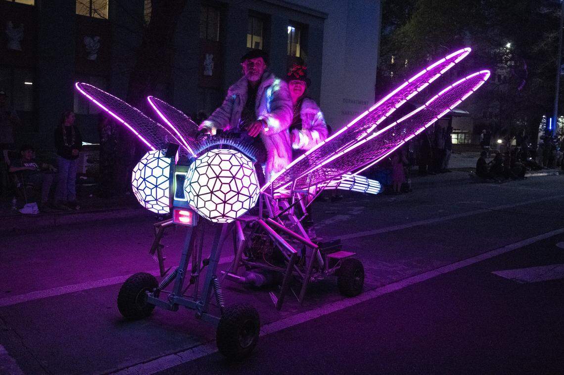 A giant dragonfly is driven down Capitol Mall during the City of Trees Parade in Sacramento on Saturday, Feb. 28, 2026.