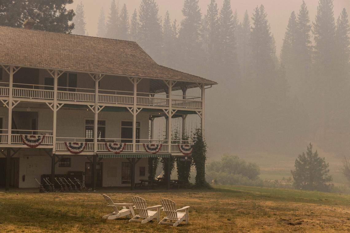 The Wawona Hotel, undamaged from the Washburn Fire, is seen under a smoke-filled sky in Yosemite National Park on Monday, July 11, 2022.
