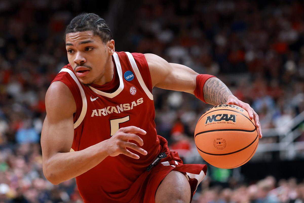Darius Acuff Jr. (5) of the Arkansas Razorbacks dribbles the ball against the Arizona Wildcats during the first half in the Sweet Sixteen of the 2026 NCAA Men’s Basketball Tournament at SAP Center on March 26, 2026 in San Jose.