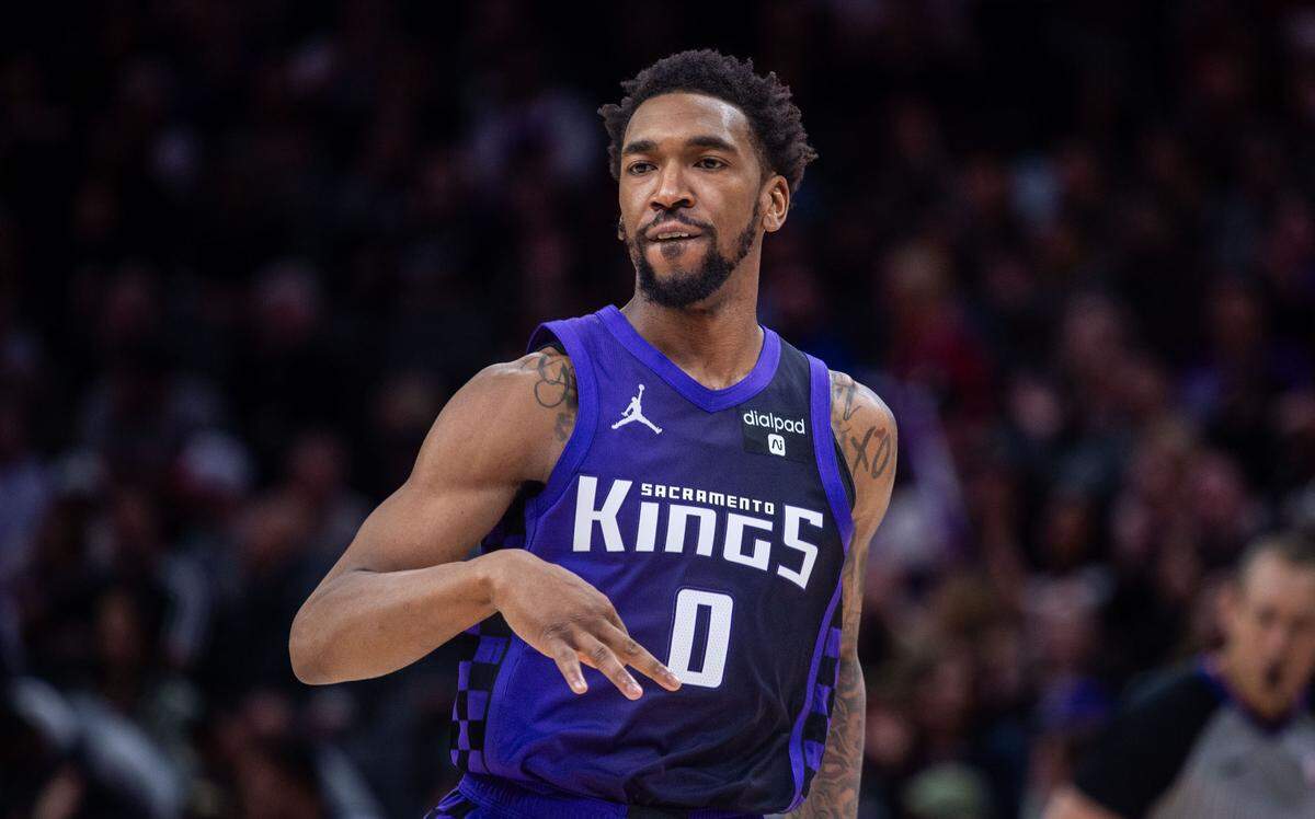 Sacramento Kings guard De’Aaron Fox (5) celebrates a three point basket as he scored a team high 23 points during an NBA game against the Denver Nuggets on Friday, Feb. 9, 2024 at Golden 1 Center.