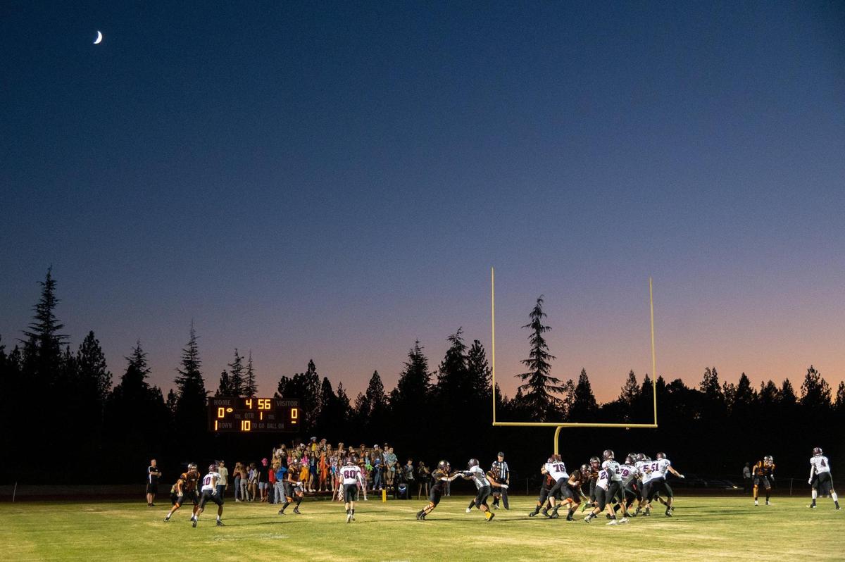The Foresthill High School Wildfires play against Valley Christian Lions at Foresthill High School in Foresthill on Friday. It was the Wildfires first home game since the Mosquito Fire.