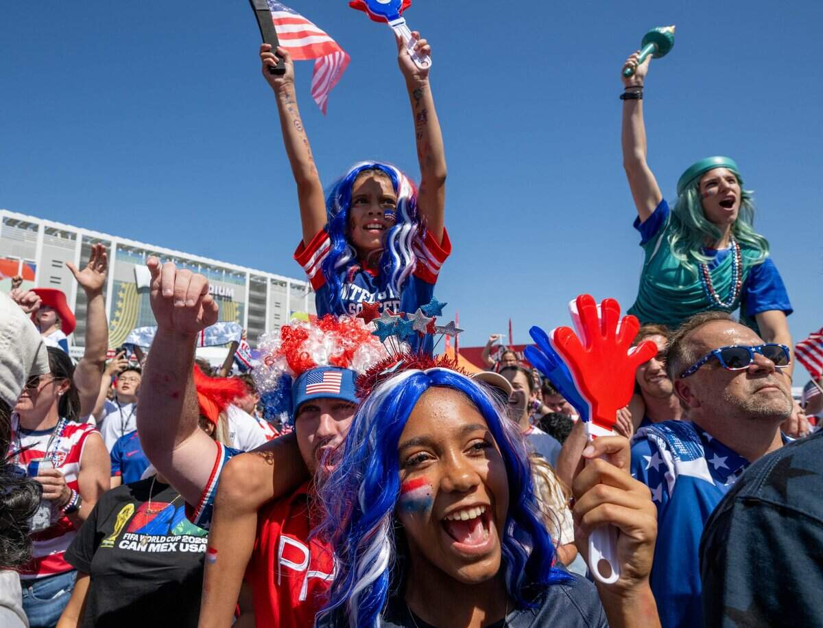 USA fan Izzy Ferguson, 9, sits on the shoulders of her father, Patrick Ferguson, alongside her sister, Gianna Gomes, 13, before the FIFA World Cup 2026 Round of 32 match between the United States and Bosnia and Herzegovina at Levi's Stadium on Wednesday, July 1, 2026, in Santa Clara.