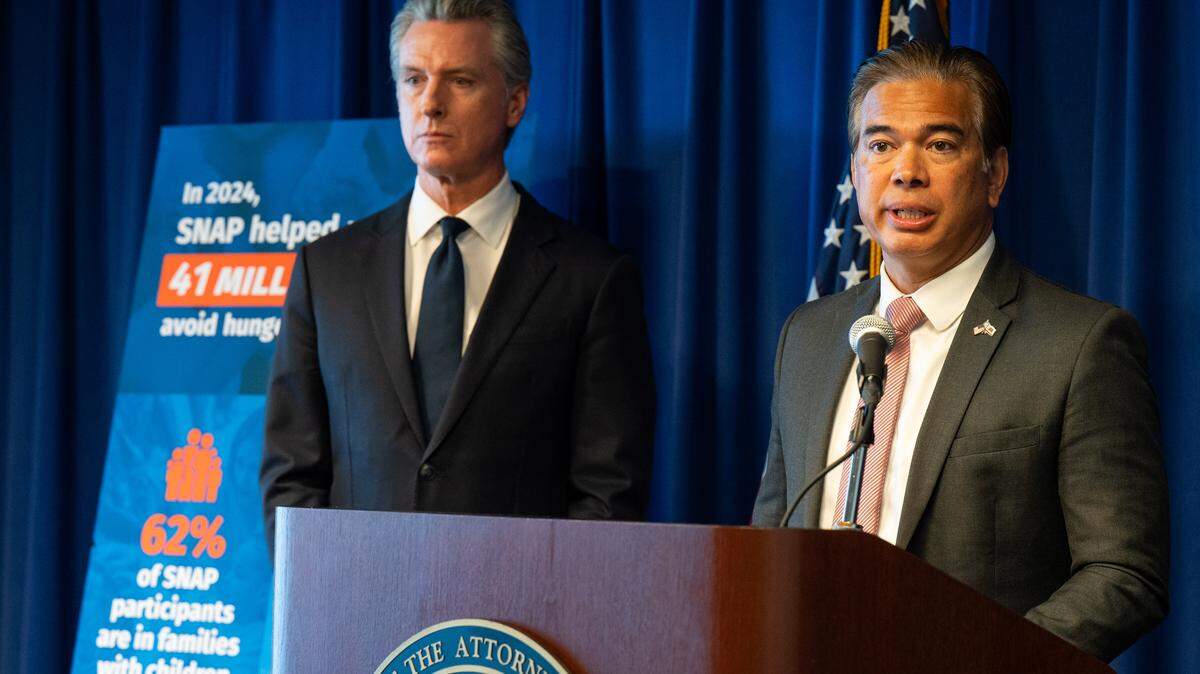 California Attorney General Rob Bonta, shown here with Gov. Gavin Newsom at a news conference on October 2025 in Sacramento, announced California was joining 23 other states in suing President Donald Trump over his executive order restricting mail ballots. 
