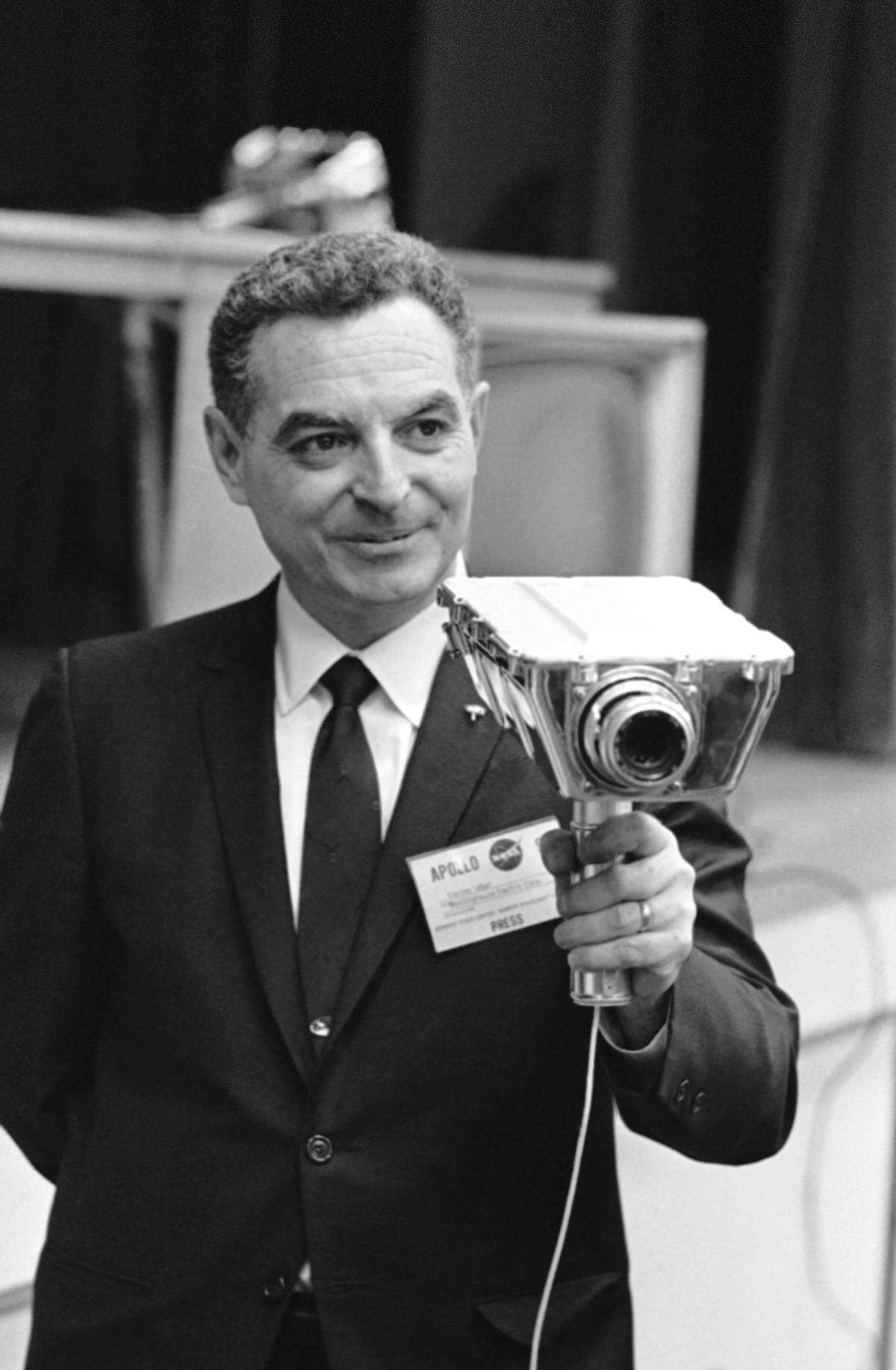 This television camera is the one Apollo astronauts will take with them when they land on the moon, held by Stanley Lebar, program manager for Westinghouse Electric Corporation in April 1969. Built by Westinghouse for the National Aeronautics and Space Administration, the camera is capable of operating both in the vacuum of space and in the special atmosphere of the Apollo spacecraft. In addition, the imaging tube in the camera will make it possible to produce pictures in the darkness of the lunar night. The camera can withstand temperature extremes ranging from the 250 degrees Fahrenheit it will encounter during the lunar day to 300 degrees below zero at night. (AP Photo)