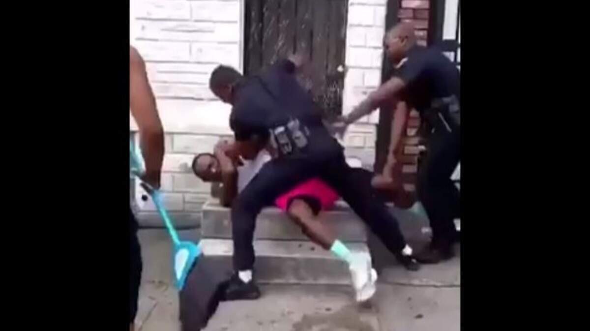 A Baltimore police officer has been suspended with pay after a viral video showed him raining blows Saturday on a man who does not appear to be resisting, police said. The city’s mayor called the video “disturbing.”