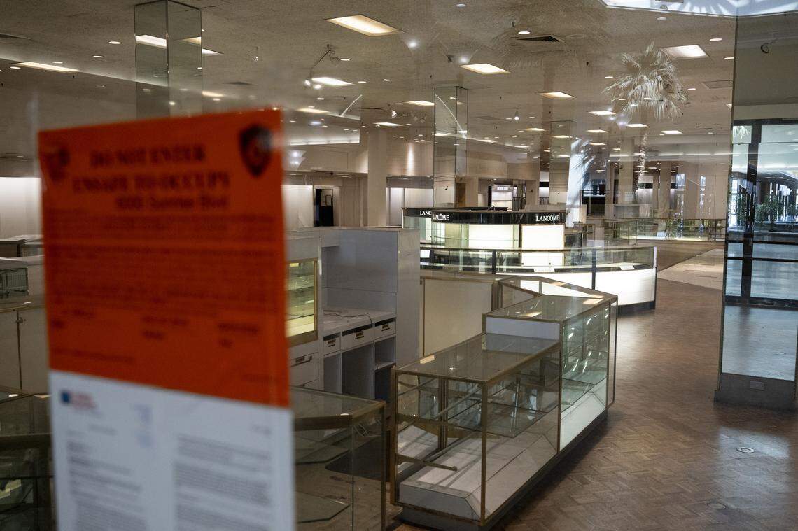 A sign in the window describes the former Macy’s store at Sunrise Mall in Citrus Heights as unsafe to occupy earlier this month. 